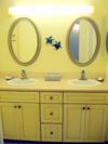 A102 - Double sinks and lots of cabinets in full bathroom
